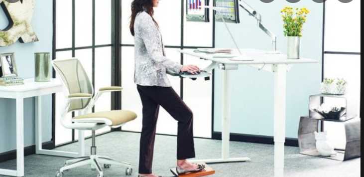 Why do people prefer working on standing desks